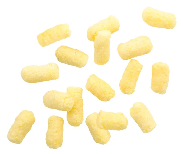 Los palitos de maíz vuelan sobre un fondo blanco. Aislado — Foto de Stock