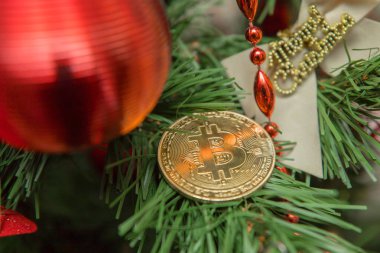 Sunni Noel Bitcoin. Sanal para biriminin sembolik görüntü.