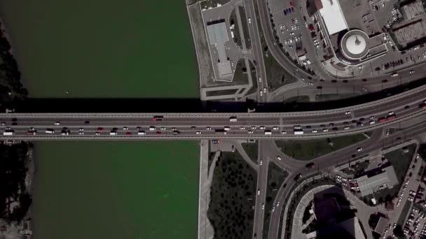 Drones Eye View - Aerial top down view of urban traffic jam on bridge — Stock Video