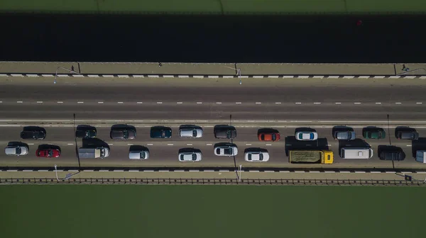 Drones Eye View - Aerial top down view of urban traffic jam on bridge