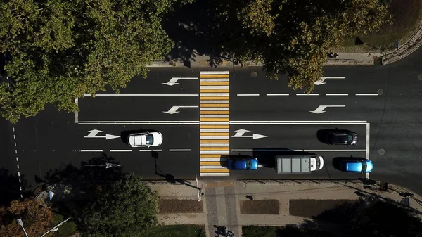 City roads from above - modern urban traffic intersection in august