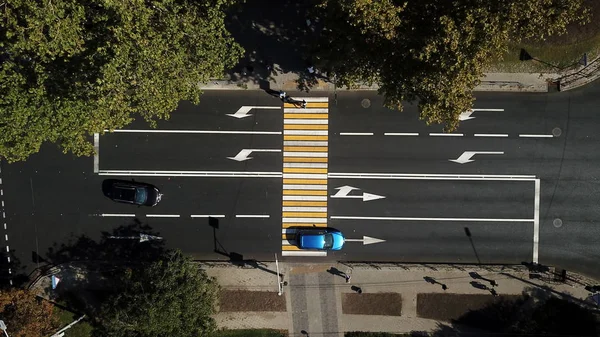 City roads from above - modern urban traffic intersection in august