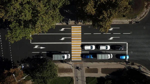 City roads from above - modern urban traffic intersection in august