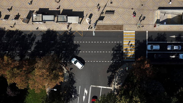 City roads from above - modern urban traffic intersection in august