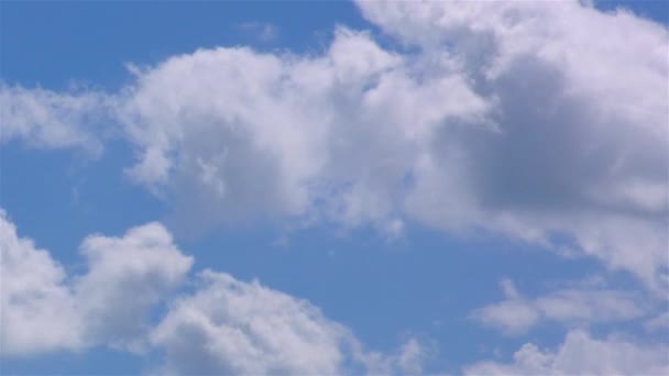 Time-lapse motion clouds blue sky background — Stock Video