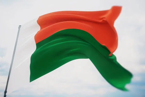 Zwaaiende vlaggen van de wereld - vlag van Madagaskar. Schot met een ondiepe scherptediepte, selectieve focus. 3D illustratie. — Stockfoto