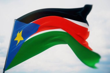 Dünyanın bayraklarını sallıyordu. Güney Sudan bayrağı. Sığ bir alan derinliği ve seçici bir odak noktasıyla vurulmuş. 3B illüstrasyon.