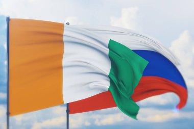 Rus bayrağı ve Cote Ivoire bayrağı sallıyor. Yakın görünüm, 3 boyutlu illüstrasyon.