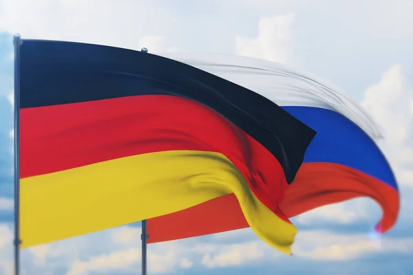 Viftar med rysk flagga och tysk flagga. Närbild, 3D-illustration. — Stockfoto