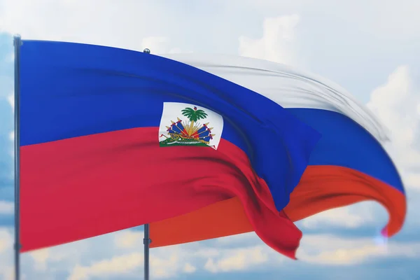 Waving Russian flag and flag of Haiti. Closeup view, 3D illustration. — Stock Photo, Image