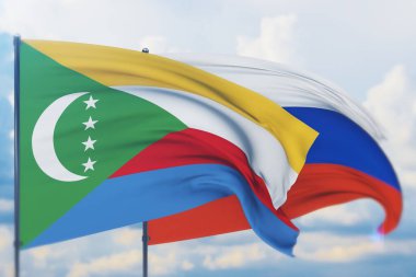 Rus bayrağı ve Komoros bayrağı sallıyordu. Yakın görünüm, 3 boyutlu illüstrasyon.