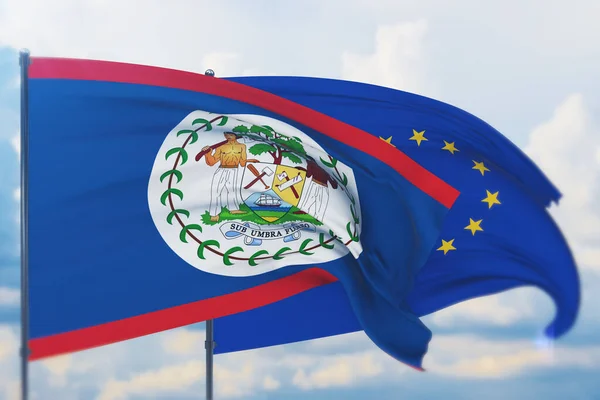 Avrupa Birliği bayrağı ve Belize bayrağı sallıyordu. Yakın görünüm, 3 boyutlu illüstrasyon. — Stok fotoğraf