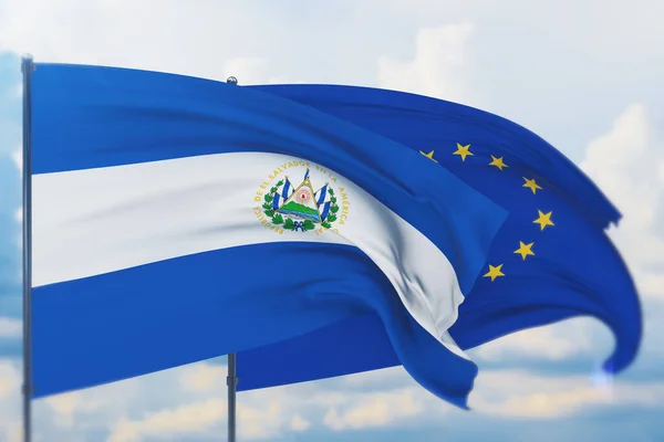 Flagge der Europäischen Union und Flagge El Salvadors schwenkend. Nahaufnahme, 3D-Illustration. — Stockfoto