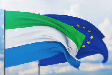 Avrupa Birliği bayrağı ve Sierra Leone bayrağı sallıyordu. Yakın görünüm, 3 boyutlu illüstrasyon.