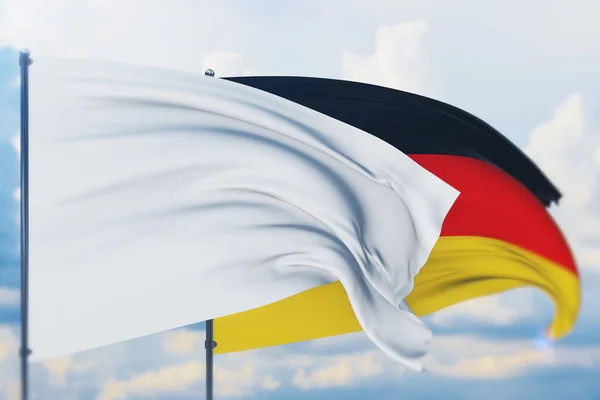 Bandiera bianca sul pennone sventola nel vento e bandiera della Germania. Vista da vicino, illustrazione 3D. — Foto Stock