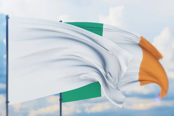 Білий прапор на флагштоку розмахує вітром і прапором Ірландії. Closeup view, 3D illustration. — стокове фото