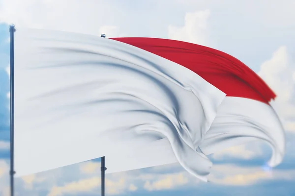 Λευκή σημαία σε κοντάρι σημαίας κυματίζει στον άνεμο και τη σημαία του Μονακό. Κλείσιμο προβολής, 3D εικονογράφηση. — Φωτογραφία Αρχείου