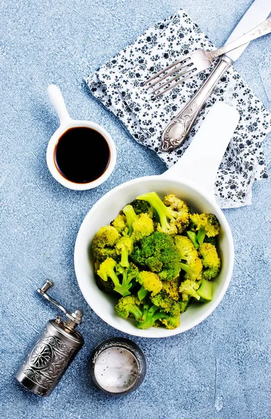 boiled broccoli in bowl, diet food, stock photo