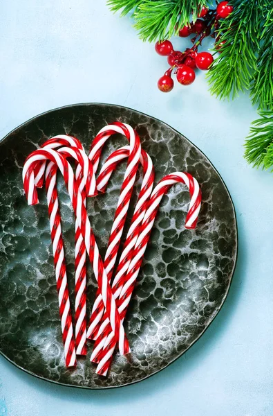 Top View Candy Canes Plate Blue Tabletop — Stock Photo, Image