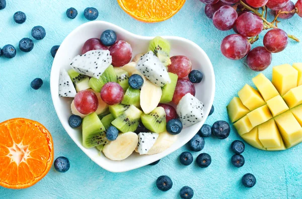 fruit salad, fresh salad with fruits and berries