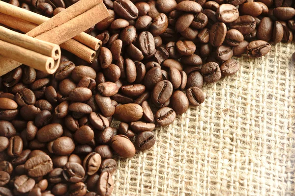 Roasted Coffee Beans Brown Burlap Background Spicy Cinnamon Sticks Copy — Stock Photo, Image