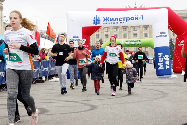 Kharkiv, Ukraine - April 14: Kharkiv International Marathon. Runners on the city streets on April 14, 2019 in Kharkiv, Ukraine