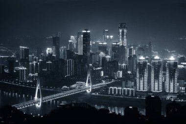Bridge and city urban architecture at night in Chongqing, China clipart