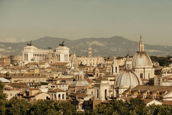 Rome rooftop view with ancient architecture, Italy.