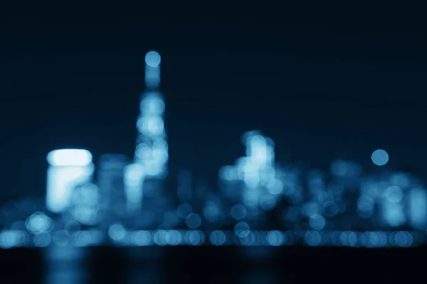Panoramic view of New York City skyline with skyscrapers, blur background