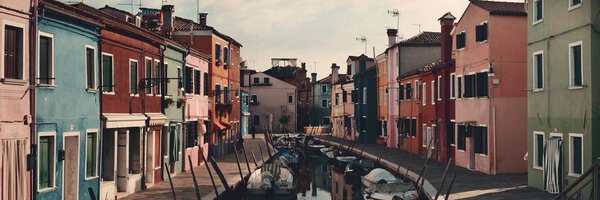 Colorful Burano canal panorama view in Venice, Italy.
