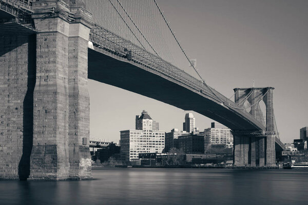 Brooklyn bridge at waterfront in downtown Manhattan New York City.