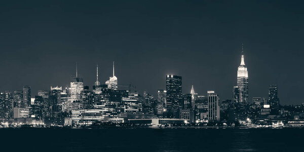 Midtown Manhattan skyline black and white at dusk panorama over Hudson River