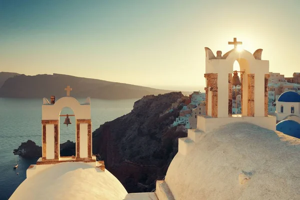 Santorini taivaanrantaan kello — kuvapankkivalokuva