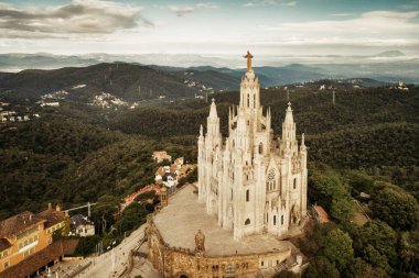 Tibidabo Temple of the Sacred Heart of Jesus viewed from air in Barcelona, Spain clipart