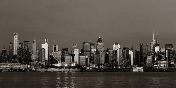 Midtown Manhattan skyline BW at dusk panorama over Hudson River
