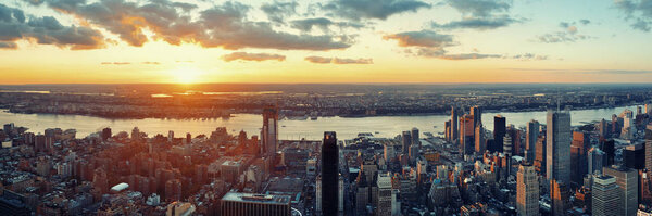 New York City west side urban cityscape panorama view at sunset.