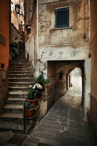 Typical alley view in Riomaggiore in Cinque Terre, Italy.