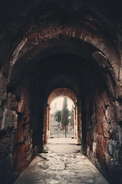 stock image Archway in Colosseum, the world known landmark and the symbol of Rome, Italy.