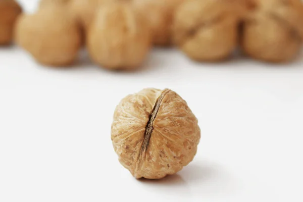 Walnuts on a white background — Stock Photo, Image