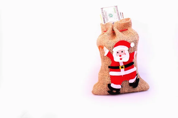 新年やクリスマスの贈り物としてお金の袋 — ストック写真