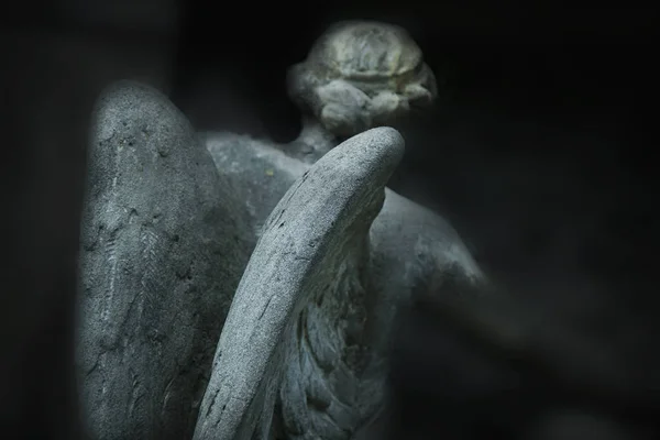 angel of death as a symbol of the end of life. Ancient statue. (Religion, eternal life, immortality, faith concept)