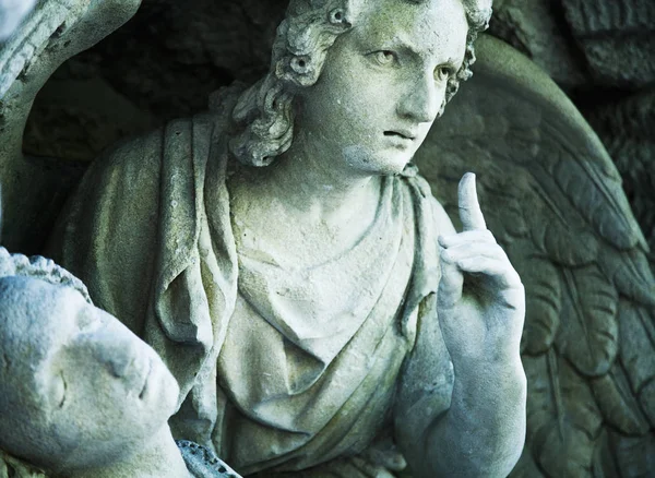 angel of death as a symbol of the end of life. Ancient statue. (Religion, eternal life, immortality, faith concept)