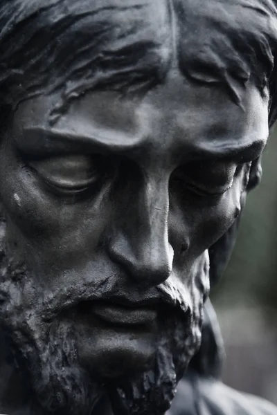 Statue of sad Jesus Christ (religion, faith, death, resurrection, eternity concept)