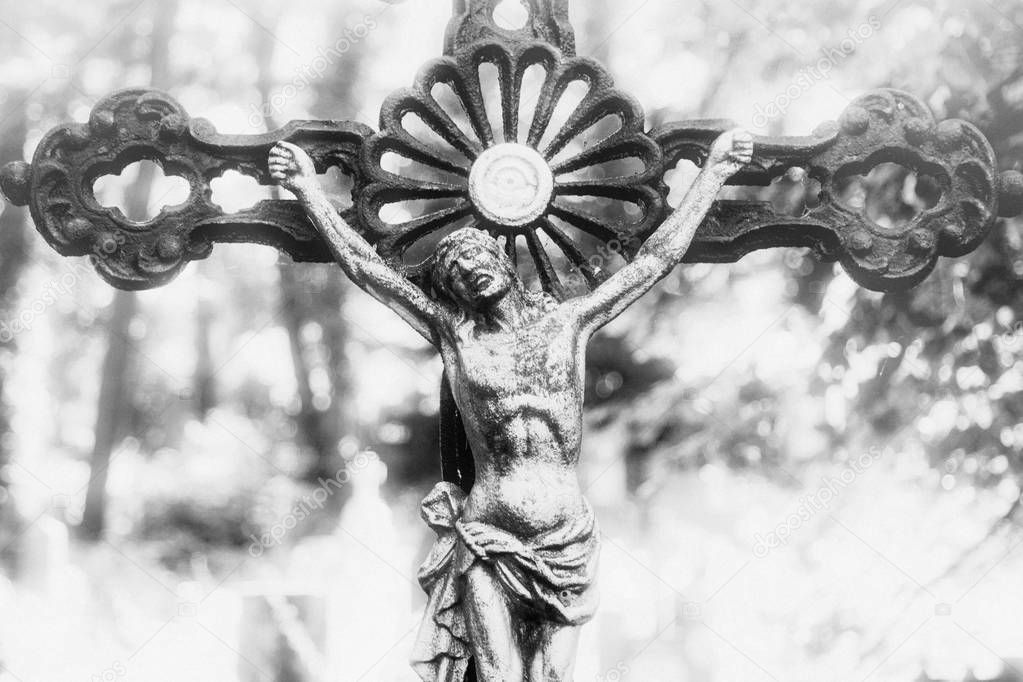 the crucifixion of Jesus Christ as a symbol of God's love. Ancient statue