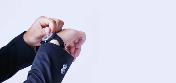 Time to work! Businessman checking time on his wrist watch (work, responsibility, success, timemanagement concept)