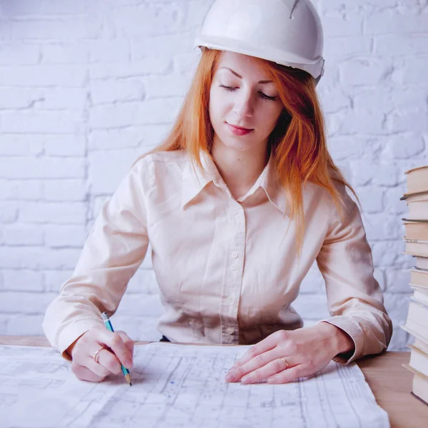 Portrait of female industrial engineer working in bureau of design and construction