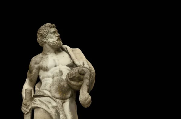 Forntida staty av Hercules på svart bakgrund — Stockfoto