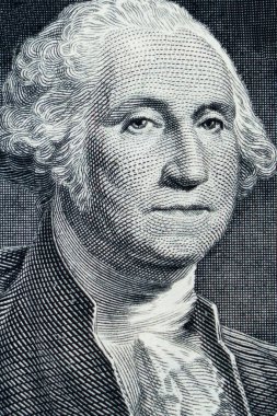 George Washington 'un bir dolarlık banknottaki portresi İş, Servet ve Kâr' ın sembolü.