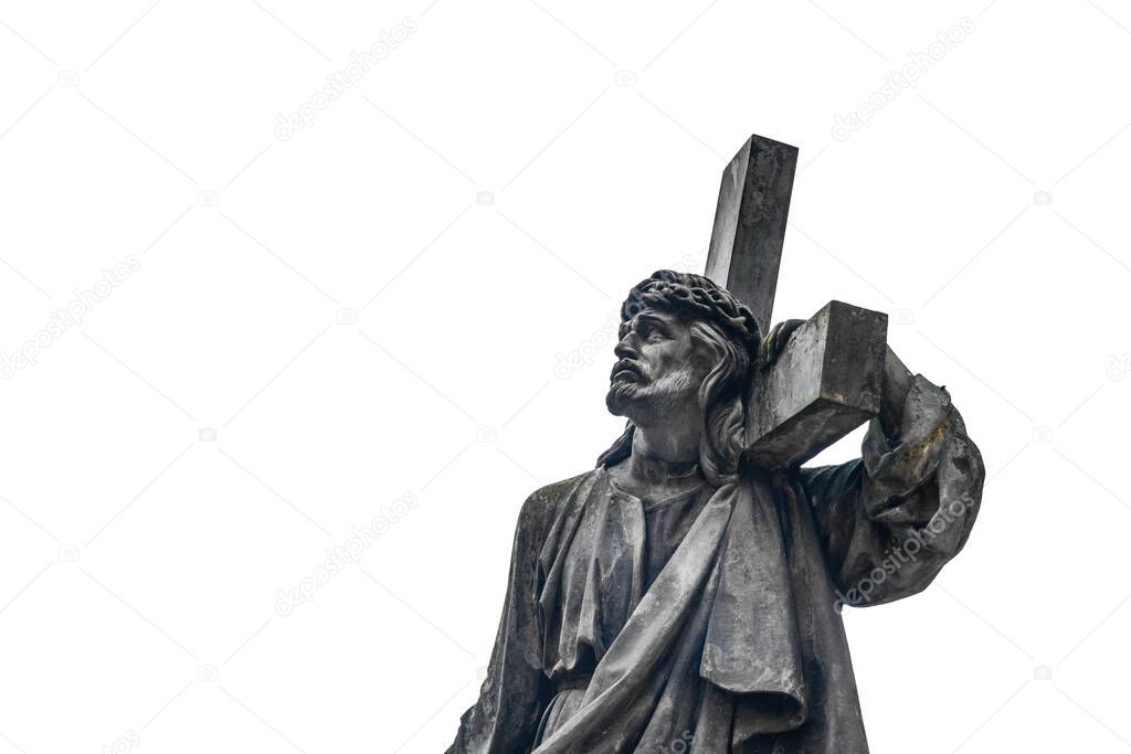Jesus Christ with holy cross. Ancient stone statue isolated on white background. 