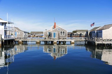 Harbor House in quiet and calm morning in Nantucket Island clipart